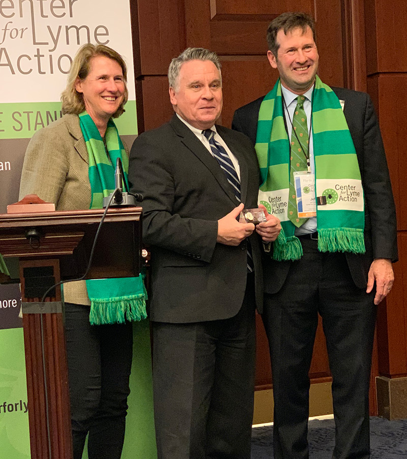 Rep. Chris Smith, flanked by Bonnie and Jeff Crater - Lyme Disease Funding