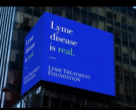 Times Square billboard message: "Lyme disease is real. Treatment saves lives."